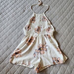 ⭐ Full Tilt Floral Romper Medium